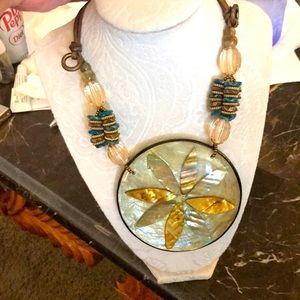 Nice necklace.  Looks great with olive green.